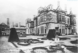 An old photograph showing formal gardens