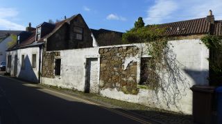 Shell of next-door cottage, view from north