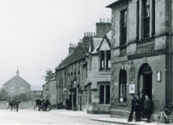 The church in the early 20th century at the end of the High Street (Town Hall on right)