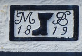 Dated stone with boot