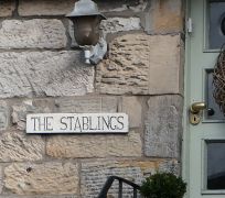 Name beside door